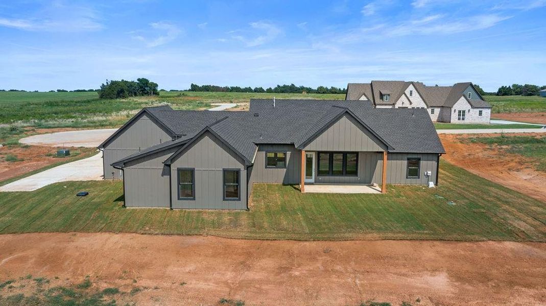 Front exterior of a new home in , Whitesboro, TX, highlighting curb appeal (Image 24). Front exterior of a new home in , Whitesboro, TX, highlighting curb appeal (Image 24).