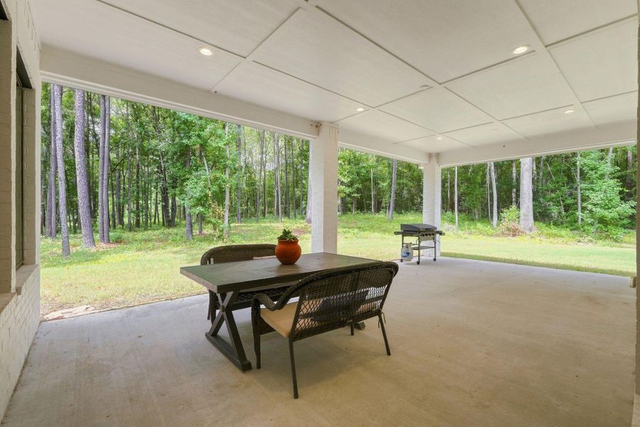 Exterior details and patio area of a home in , New Waverly (Image 4).