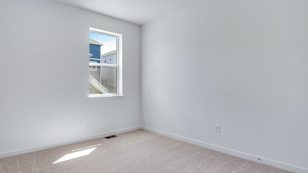Spacious, unfurnished interior of a new home in Trails at Crowfoot, Parker (Image 33).