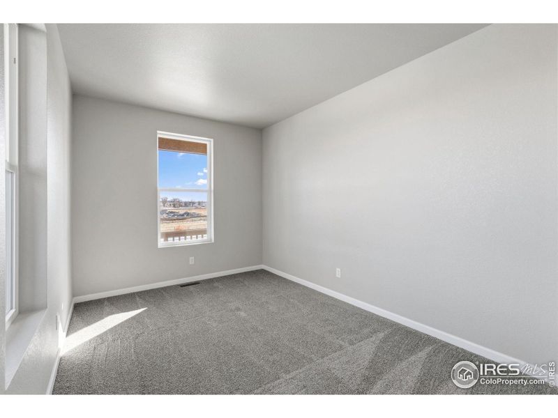 Spacious, unfurnished interior of a new home in Cordovan, Longmont (Image 19).