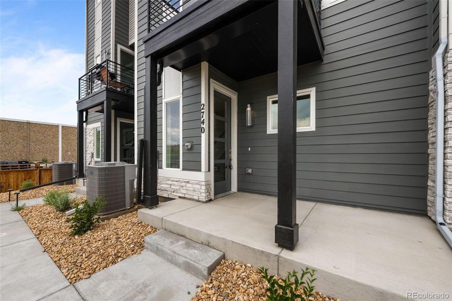 Front exterior of a new home in , Denver, CO, highlighting curb appeal (Image 1).