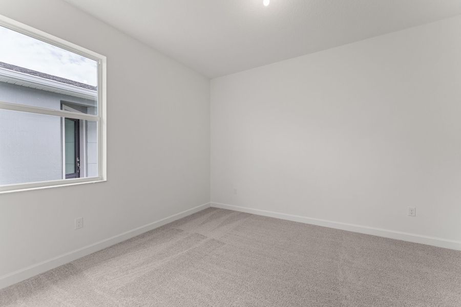 Spacious, unfurnished interior of a new home in Tradition - Kenley, Port St. Lucie (Image 14).