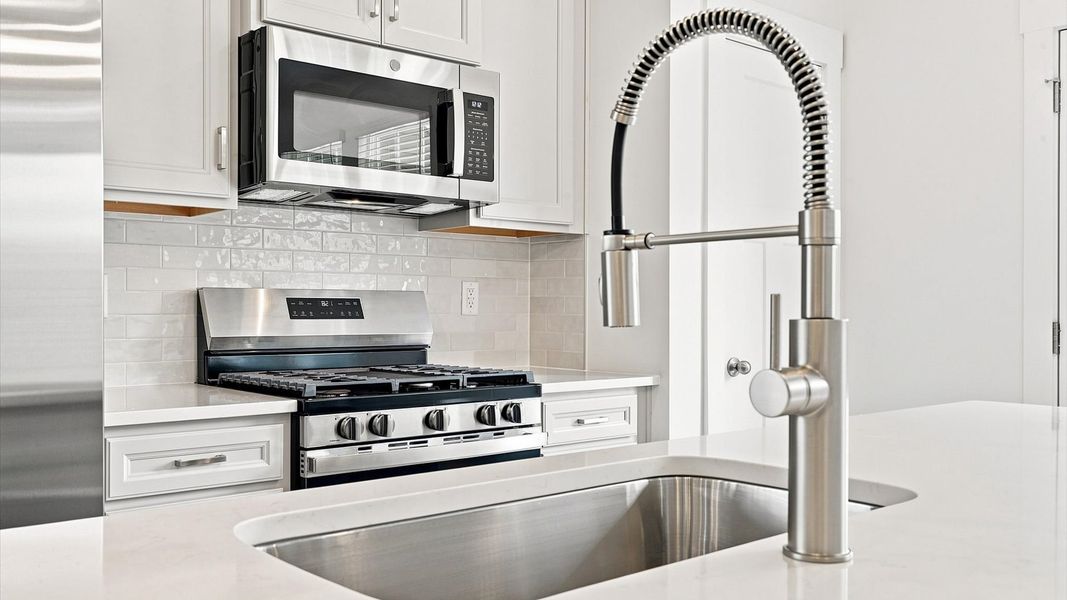 Exceptional kitchen featuring a spacious island and modern finishes located in Fountain Inn, SC Exceptional kitchen featuring a spacious island and modern finishes located in Fountain Inn, SC