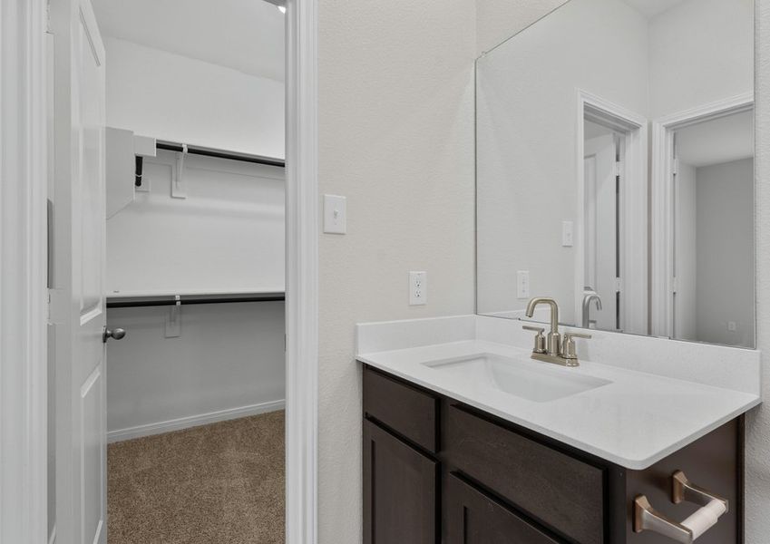 The walk-in closet is located in the master bathroom.