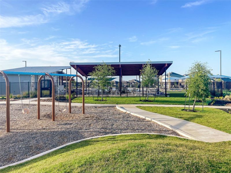 Playground, pool and park directly across the street