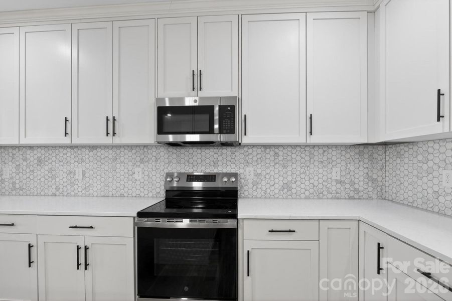 Furnished interior view inside a new home in , Lenoir (Image 5).