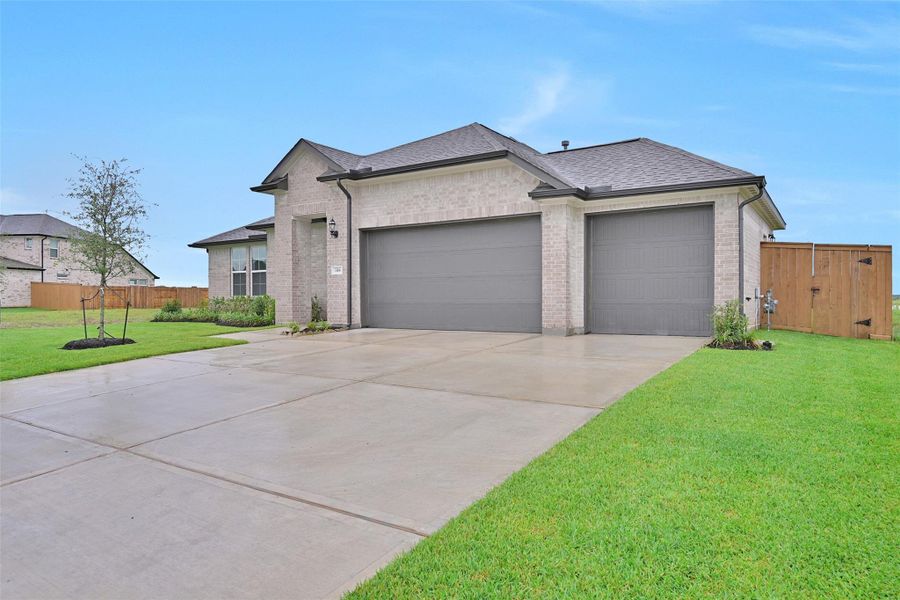 Front exterior of a new home in Lago Mar, Texas City, TX, highlighting curb appeal (Image 22).
