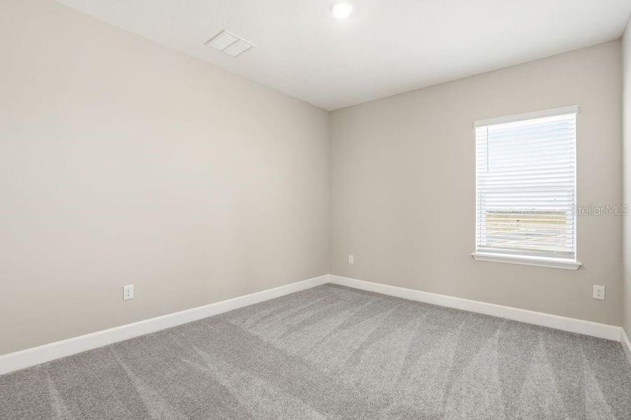 Spacious, unfurnished interior of a new home in Palms at Coasterra, Palmetto (Image 22).