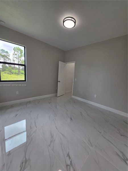 Spacious, unfurnished interior of a new home in , Lehigh Acres (Image 32).