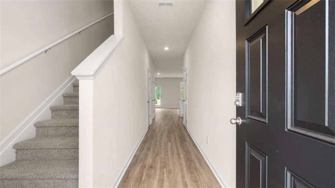 Spacious, unfurnished interior of a new home in Young's Crossing, Stone Mountain (Image 21).