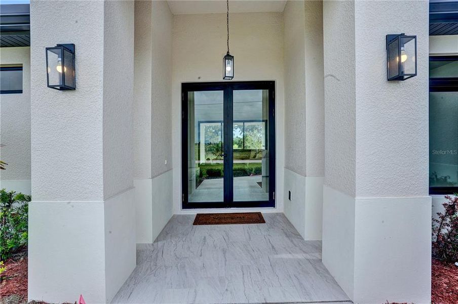 Exterior details and patio area of a home in , Cape Coral (Image 4).