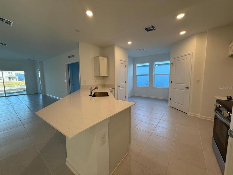 Furnished interior view inside a new home in , Kissimmee (Image 5).