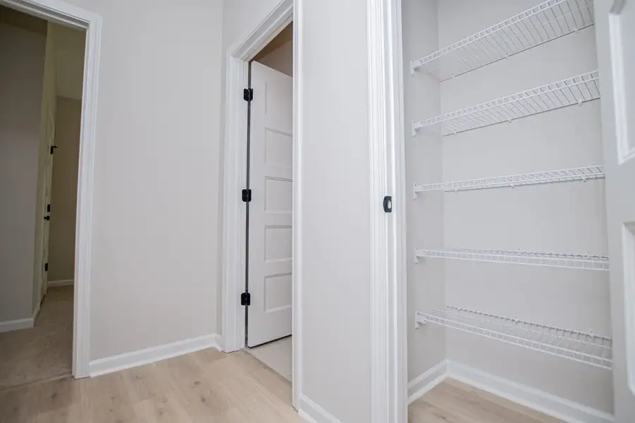 Spacious, unfurnished interior of a new home in WOODMONT RESERVE, Roopville (Image 71).