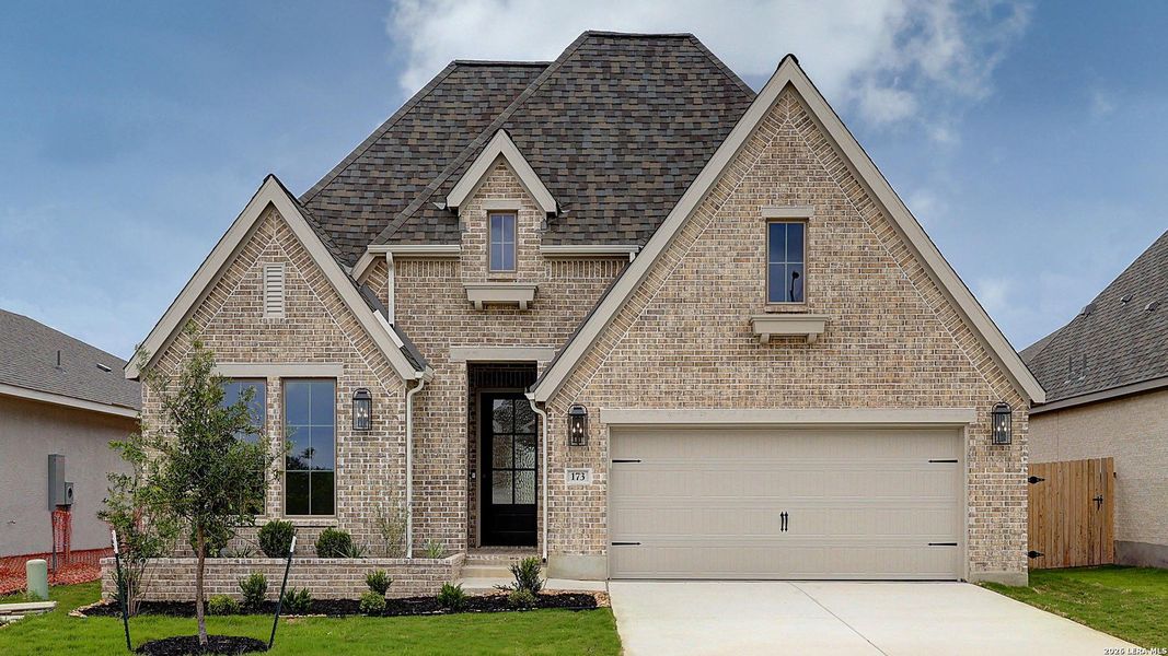Front exterior of a new home in Alsatian Oaks, Castroville, TX, highlighting curb appeal (Image 2).