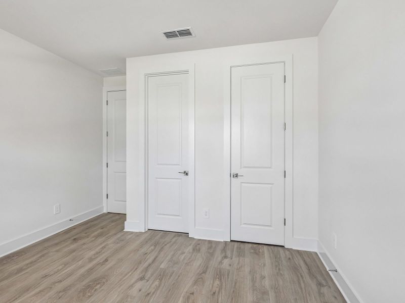 Spacious, unfurnished interior of a new home in Station Hill - Estate Series, Franklin (Image 14). Spacious, unfurnished interior of a new home in Station Hill - Estate Series, Franklin (Image 14).