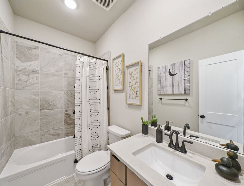Furnished interior view inside a new home in Sienna, Missouri City (Image 18).