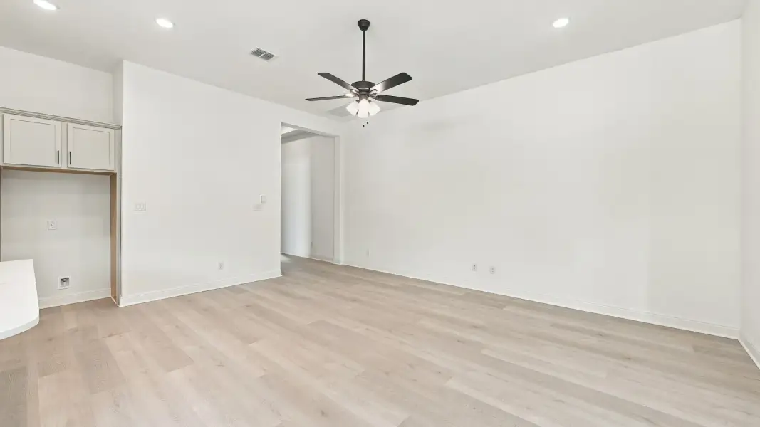 Furnished interior view inside a new home in Oaks at San Gabriel, Georgetown (Image 26).