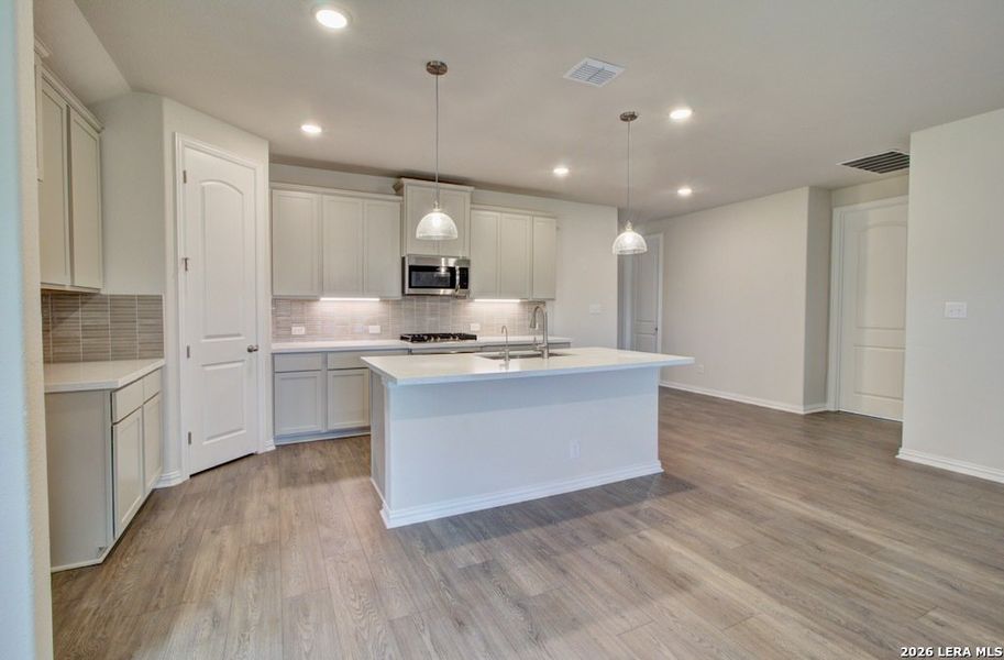 Furnished interior view inside a new home in Stream Waters, Seguin (Image 6).