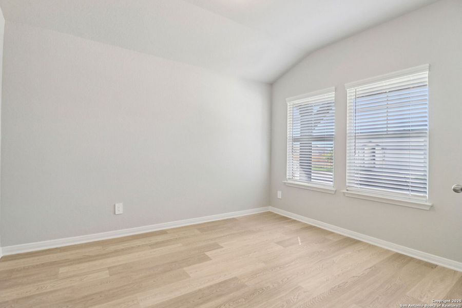 Spacious, unfurnished interior of a new home in Estancia Ranch - Premier Series, San Antonio (Image 36).