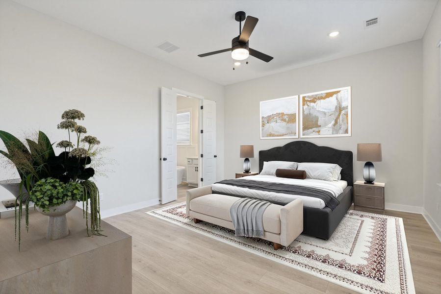 Spacious bedroom featuring light wood-finish flooring, recessed lighting, and a ceiling fan Spacious bedroom featuring light wood-finish flooring, recessed lighting, and a ceiling fan