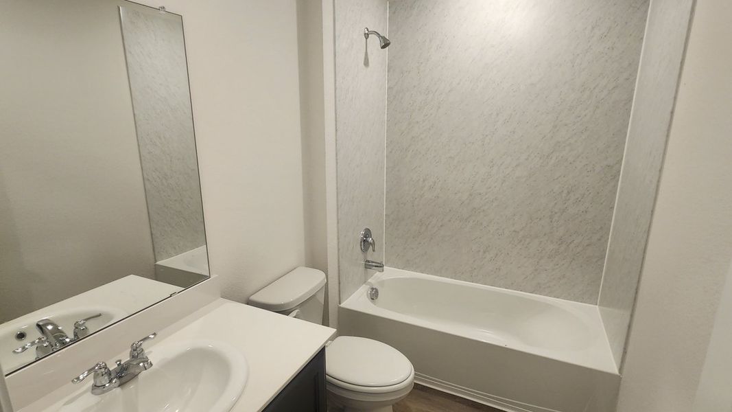 Furnished interior view inside a new home in Williamsburg, Fate (Image 6).