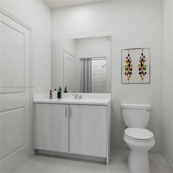 Furnished interior view inside a new home in Acacia Groves, Miami (Image 3).
