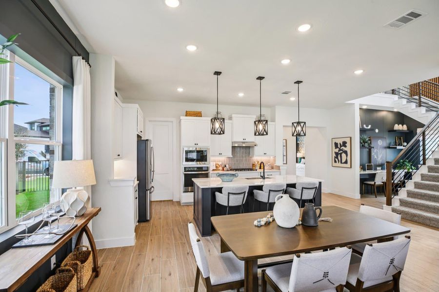 Furnished interior view inside a new home in Bridgeland, Cypress (Image 32).