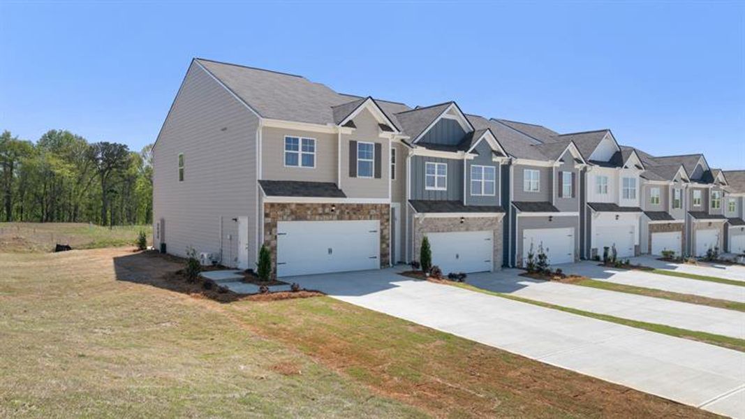 Front exterior of a new home in Rolling Meadows, Jasper, GA, highlighting curb appeal (Image 20).