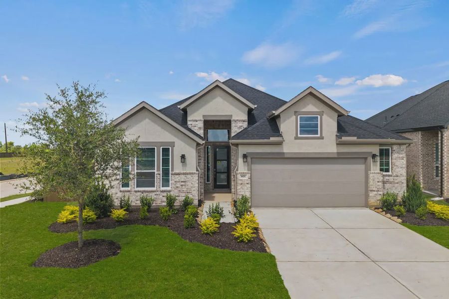 Representative exterior photo of a completed home built from the Mariah by Chesmar Homes in Lakes of Cane Island, Katy, TX (Image 23).