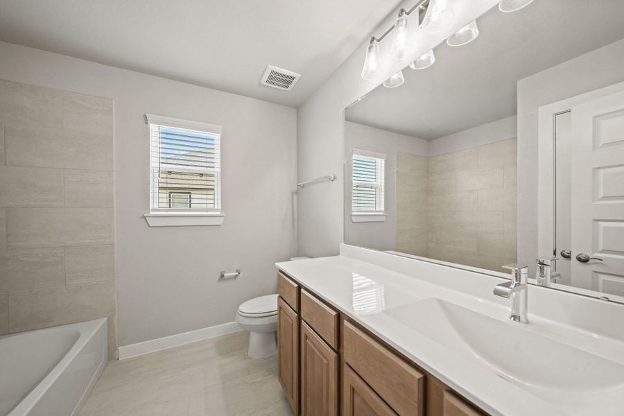 Furnished interior view inside a new home in Beacon Hill, Waller (Image 4). Furnished interior view inside a new home in Beacon Hill, Waller (Image 4).