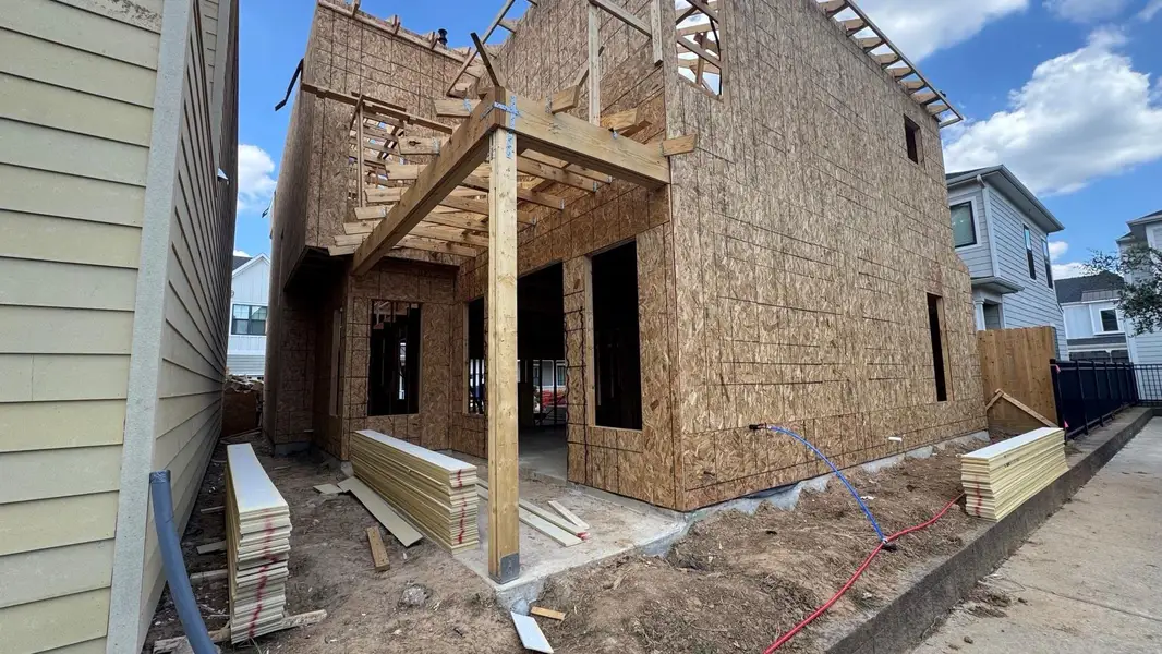 Front exterior of a new home in Timbergrove Trails, Houston, TX, highlighting curb appeal (Image 4).