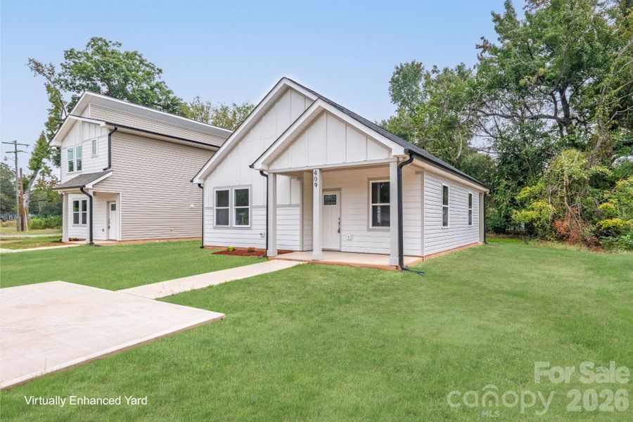 Front exterior of a new home in , East Spencer, NC, highlighting curb appeal (Image 27).