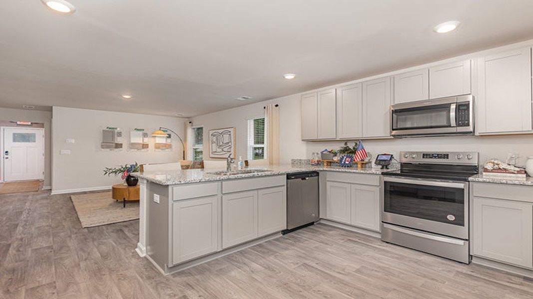Representative furnished interior of a home built from the Lewis by D.R. Horton in Summerville, Darlington (Image 7). Representative furnished interior of a home built from the Lewis by D.R. Horton in Summerville, Darlington (Image 7).