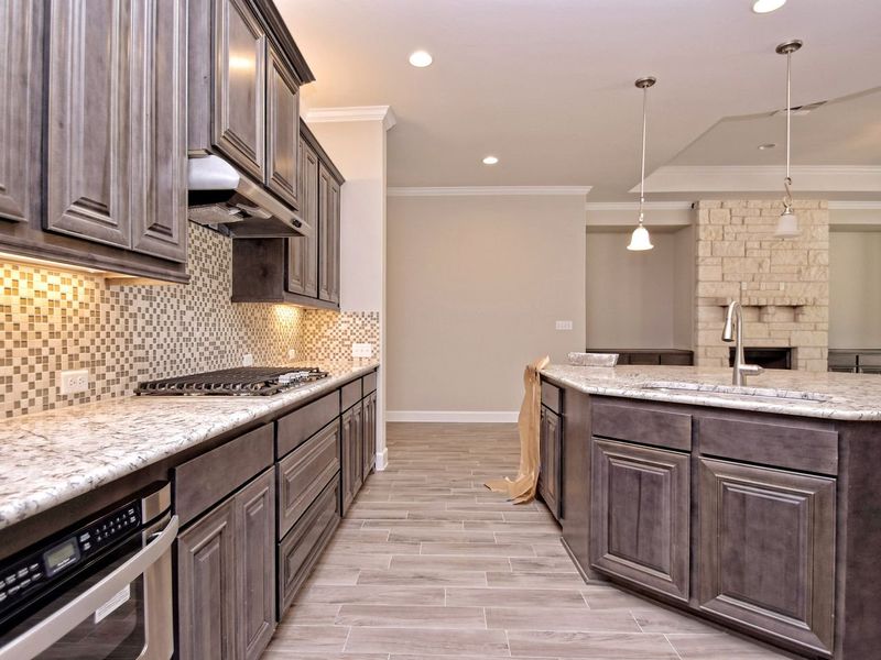 Representative furnished interior of a home built from the San Simeon I by Giddens Homes in Clearwater Ranch, Liberty Hill (Image 271).