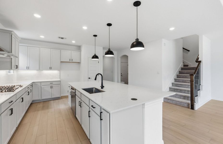 Furnished interior view inside a new home in West Cypress Hills, Spicewood (Image 9).