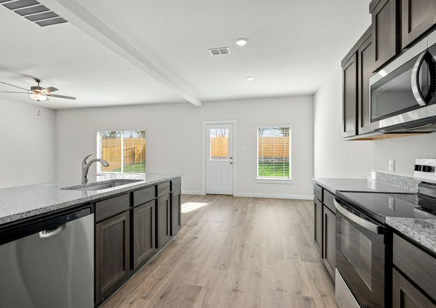 The dining room sits right off of the kitchen.