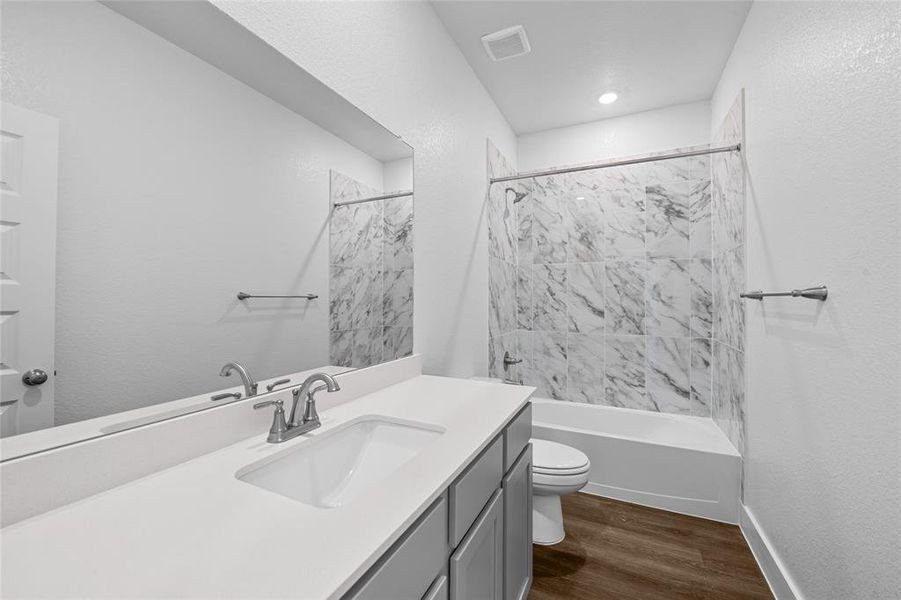 Please Note: These interior photos are not of the actual home but are of a completed one with a similar floor plan. Finishes, features, and layouts may vary.