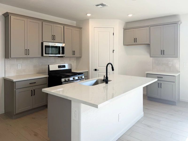 Kitchen featuring the Artisan Collection Kitchen featuring the Artisan Collection