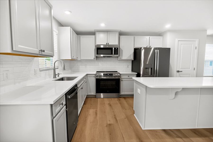Furnished interior view inside a new home in Waverly Springs, Woodruff (Image 7).
