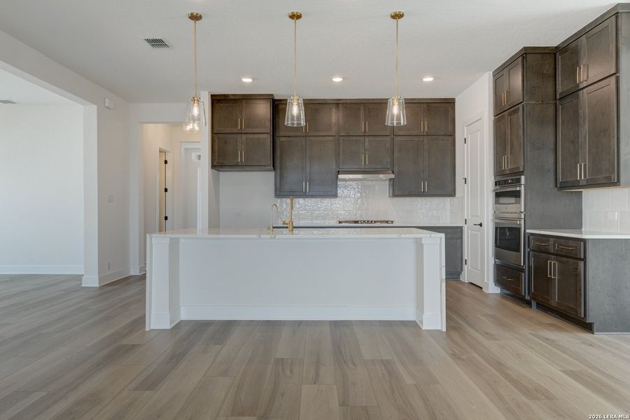Furnished interior view inside a new home in Megan's Landing, Castroville (Image 5).