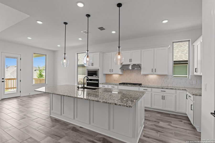 Furnished interior view inside a new home in Bison Ridge, San Antonio (Image 5).