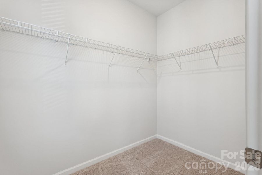 Primary walk-in closet