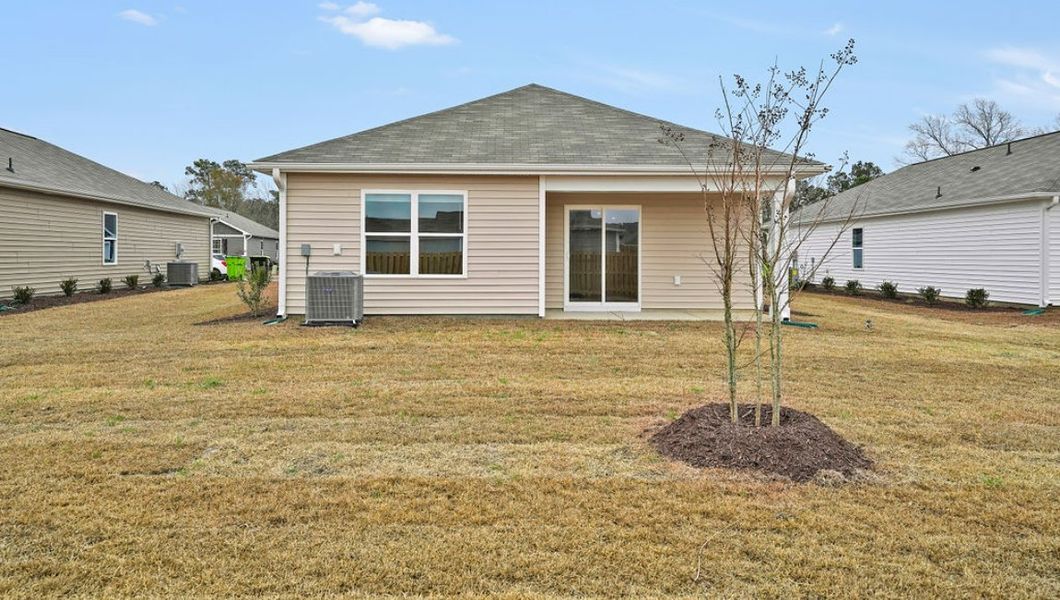 Front exterior of a new home in Lockwood Landing, Supply, NC, highlighting curb appeal (Image 2). Front exterior of a new home in Lockwood Landing, Supply, NC, highlighting curb appeal (Image 2).