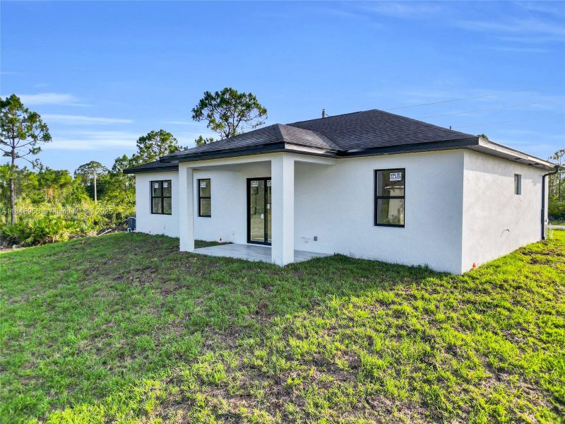 Exterior details and patio area of a home in , Lehigh Acres (Image 3).
