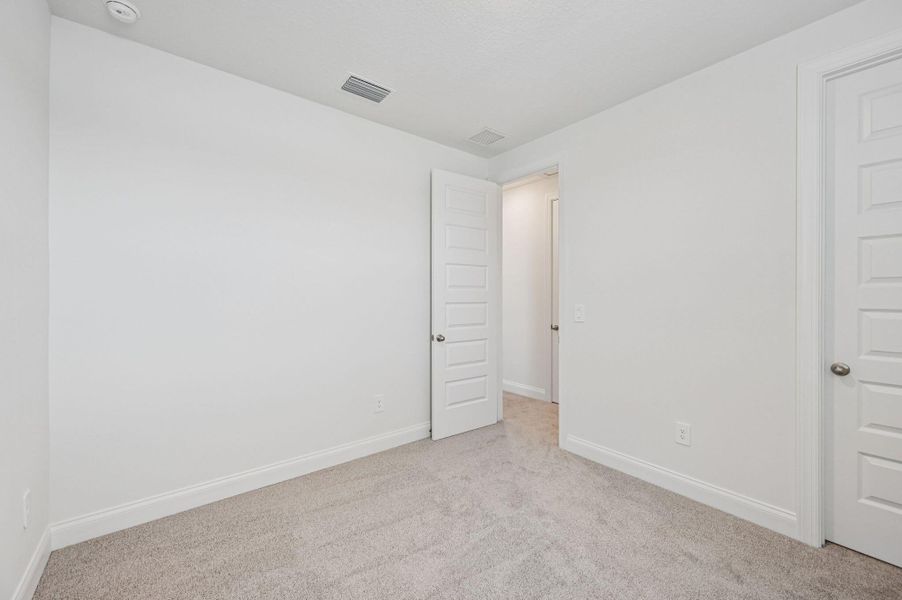 Spacious, unfurnished interior of a new home in Brystol at Wylder - Reserve Series, Port St. Lucie (Image 37).