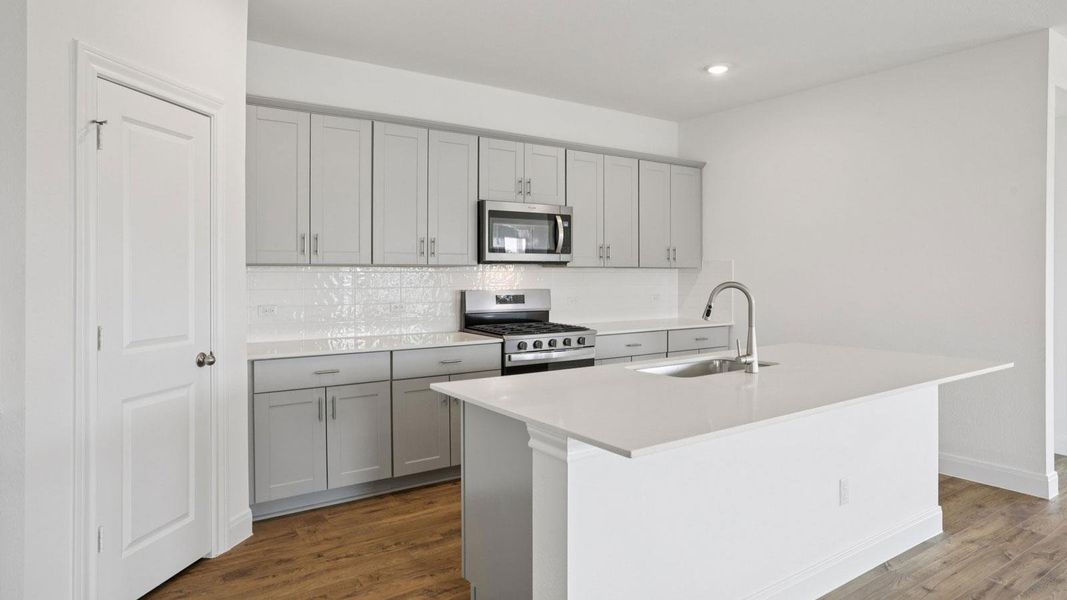 Furnished interior view inside a new home in Railhead, Cedar Creek (Image 9).