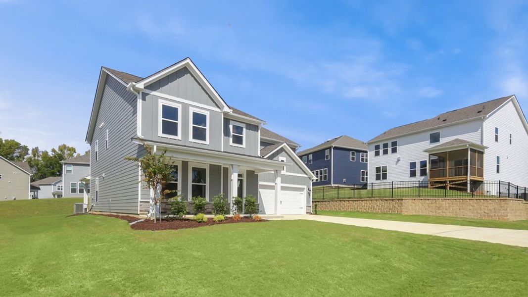 Front exterior of a new home in The Grove at Winston Pointe, Clayton, NC, highlighting curb appeal (Image 15).