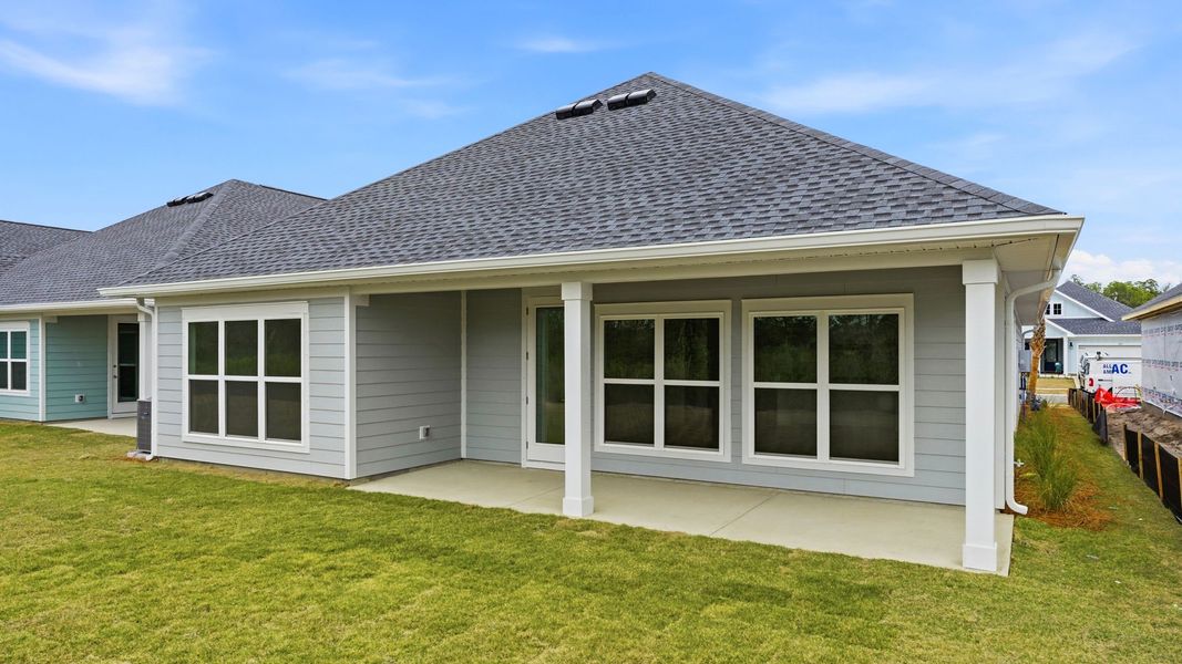 Exterior details and patio area of a home in Breakfast Point East Phase II, Panama City Beach (Image 3).