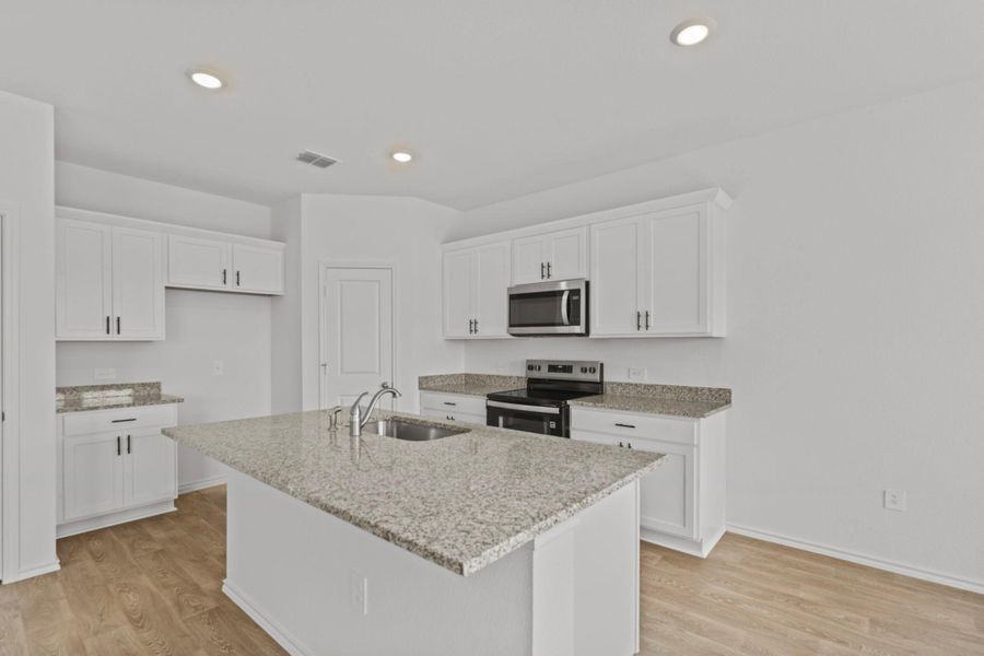 Furnished interior view inside a new home in Palomino, Manor (Image 7).