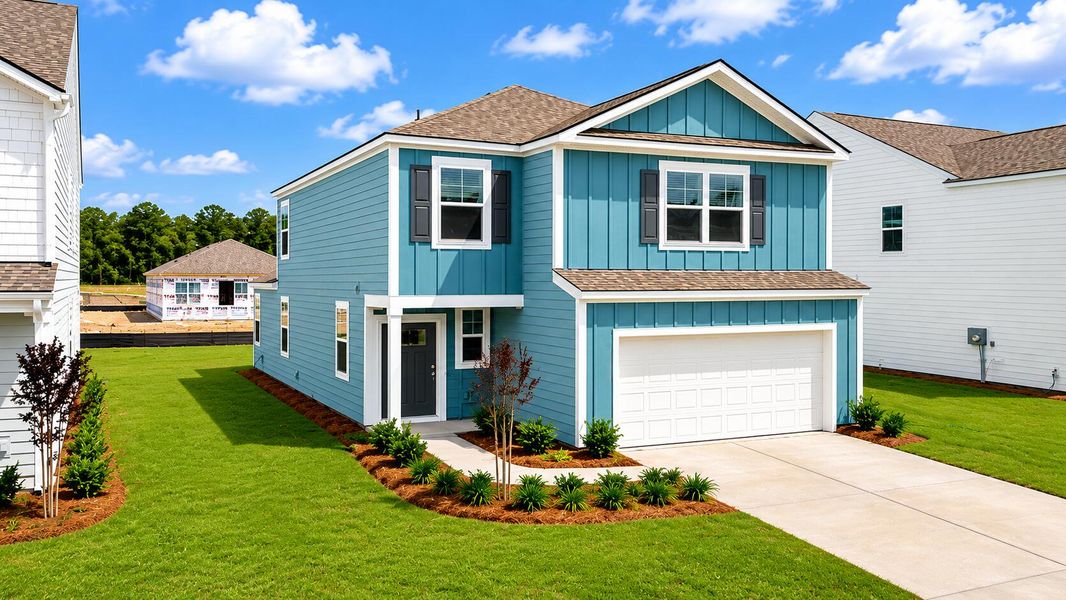 Front exterior of a new home in Hillcrest, Ravenel, SC, highlighting curb appeal (Image 2). Front exterior of a new home in Hillcrest, Ravenel, SC, highlighting curb appeal (Image 2).
